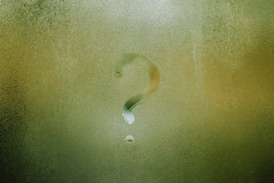 Question mark on a window 
